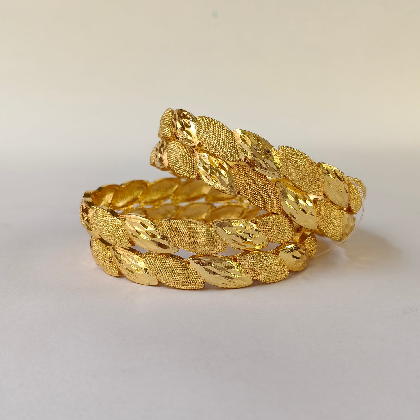 Intricate Leaf Motif Dual-Finish Bangles