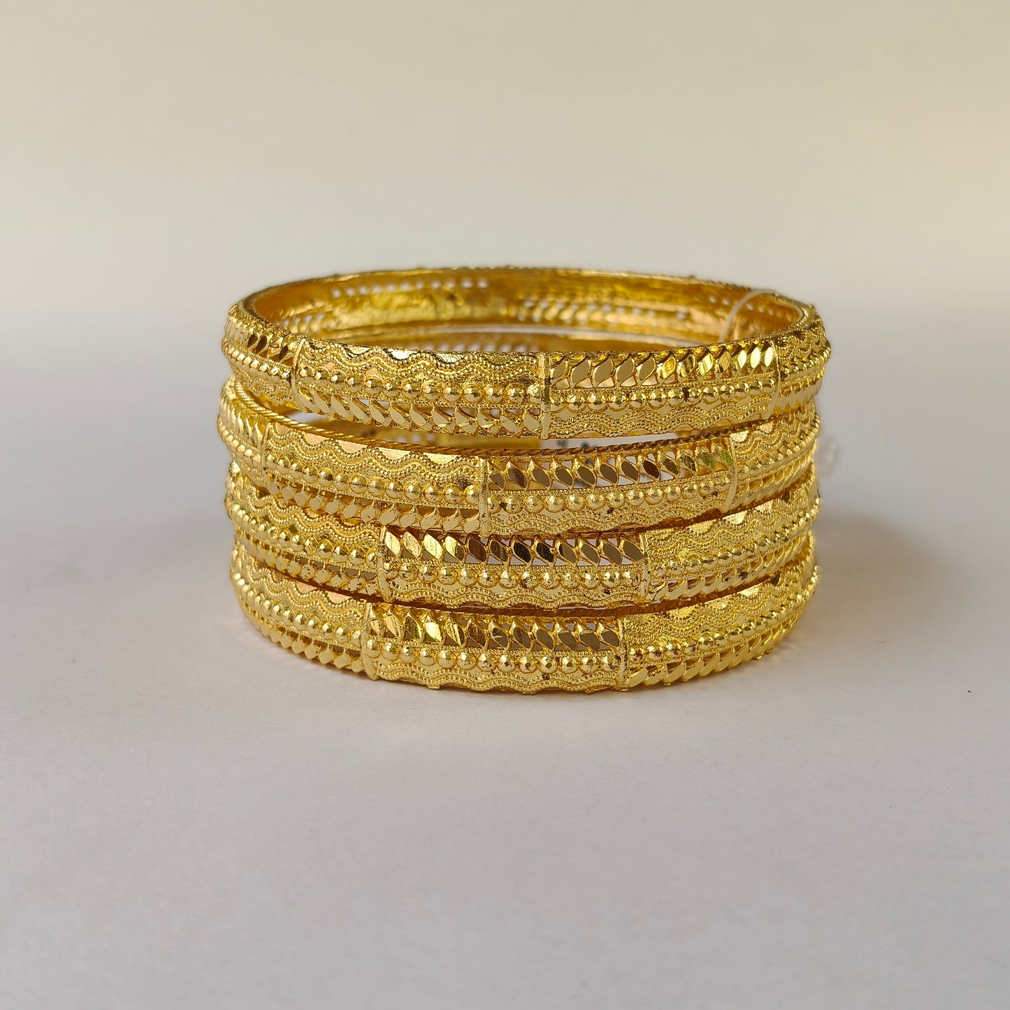 Traditional Gold Toned Intricate Textured Bangles
