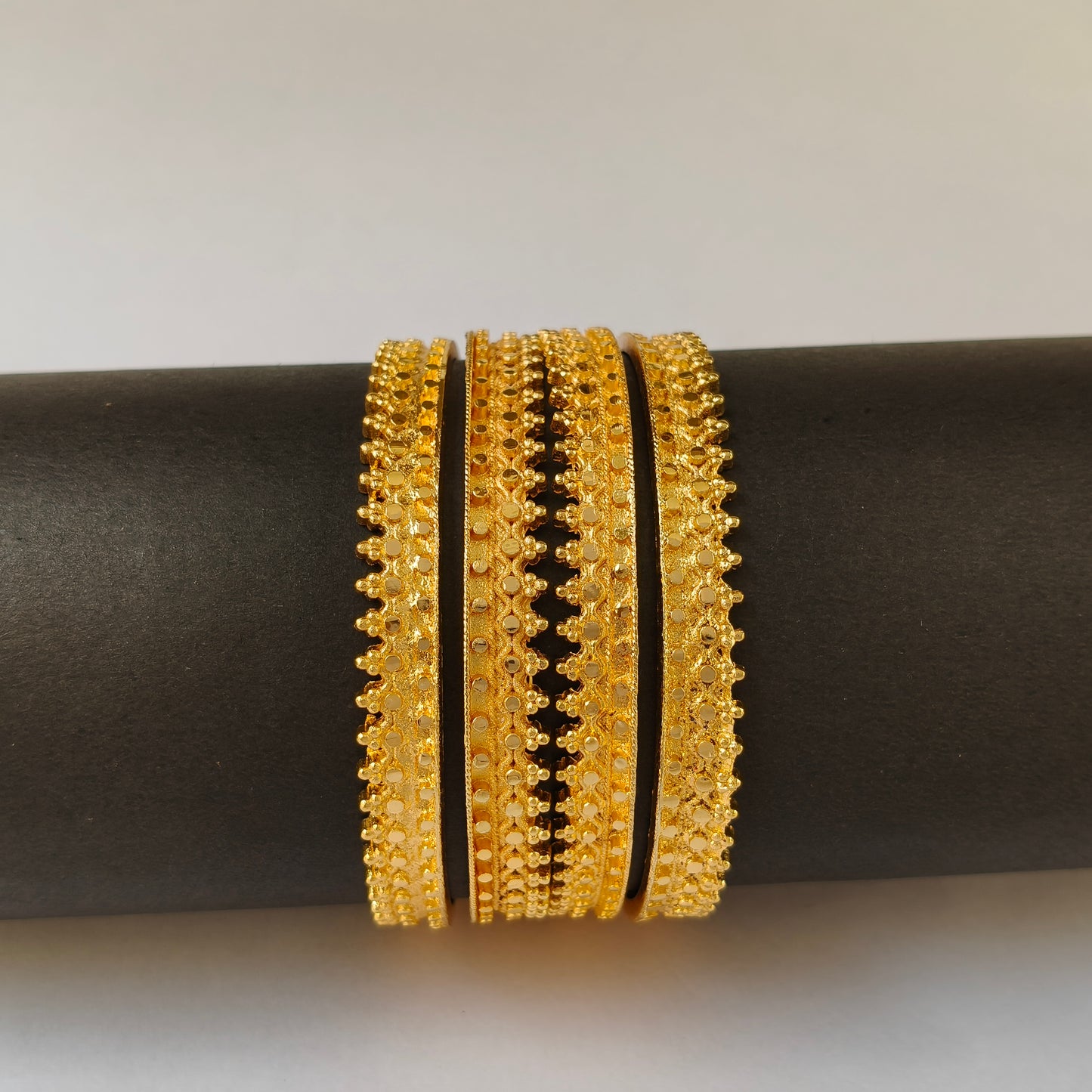 Textured Gold Toned Serrated Bangles