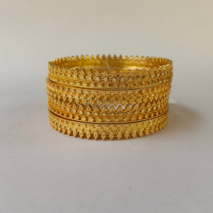 Textured Gold Toned Serrated Bangles