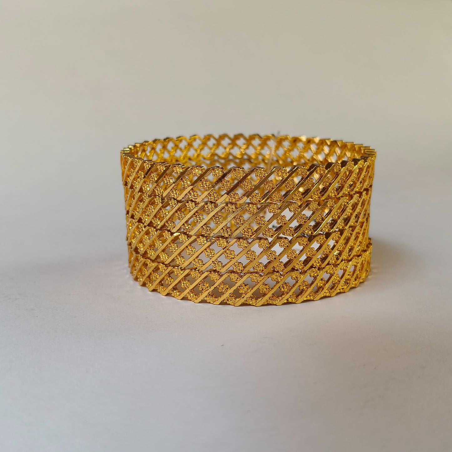 Geometric Intertwined Gold Textured Bangles - 3 Flowered