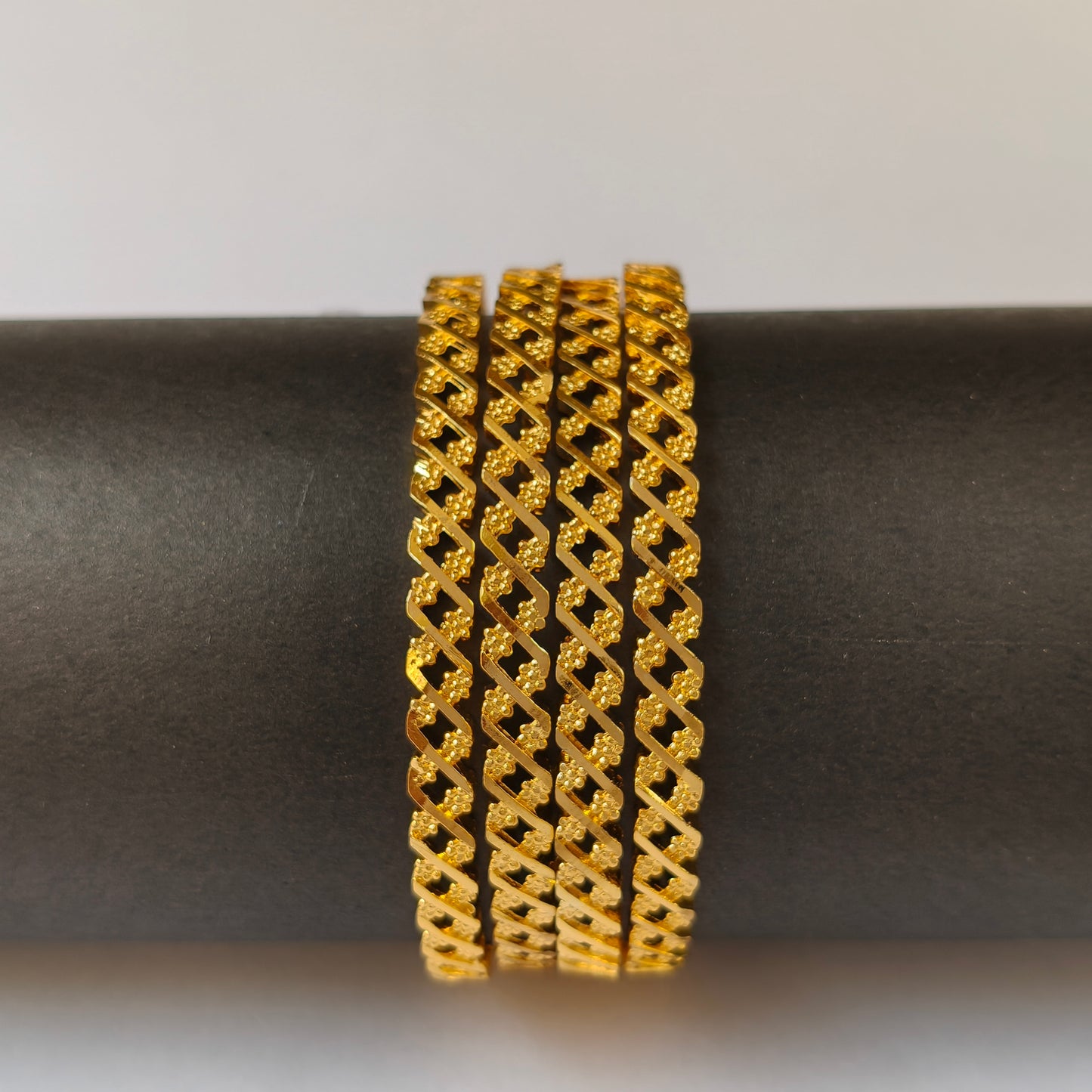 Geometric Intertwined Gold Textured Bangles - 2 Flowered