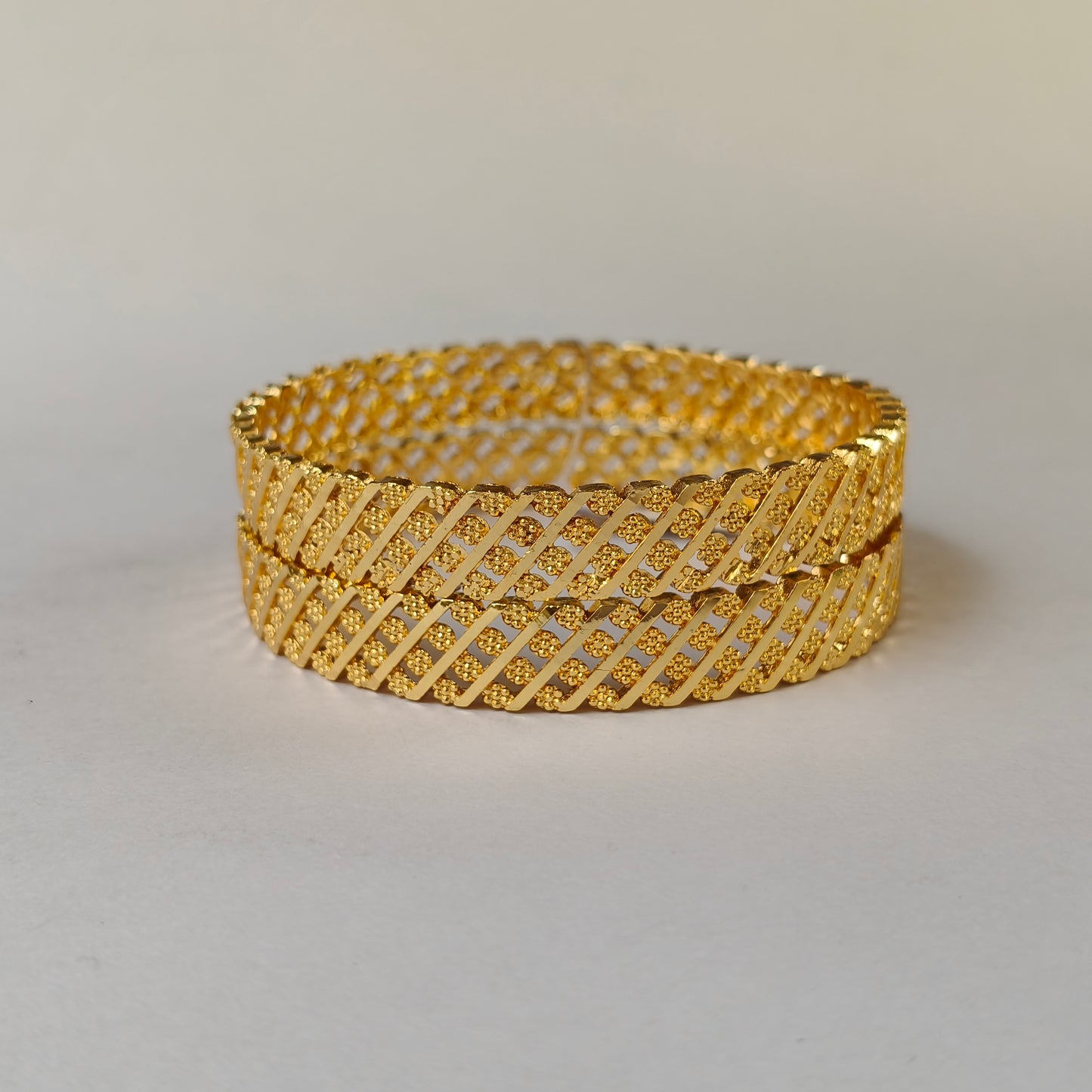 Geometric Intertwined Gold Textured Bangles - 4 Flowered