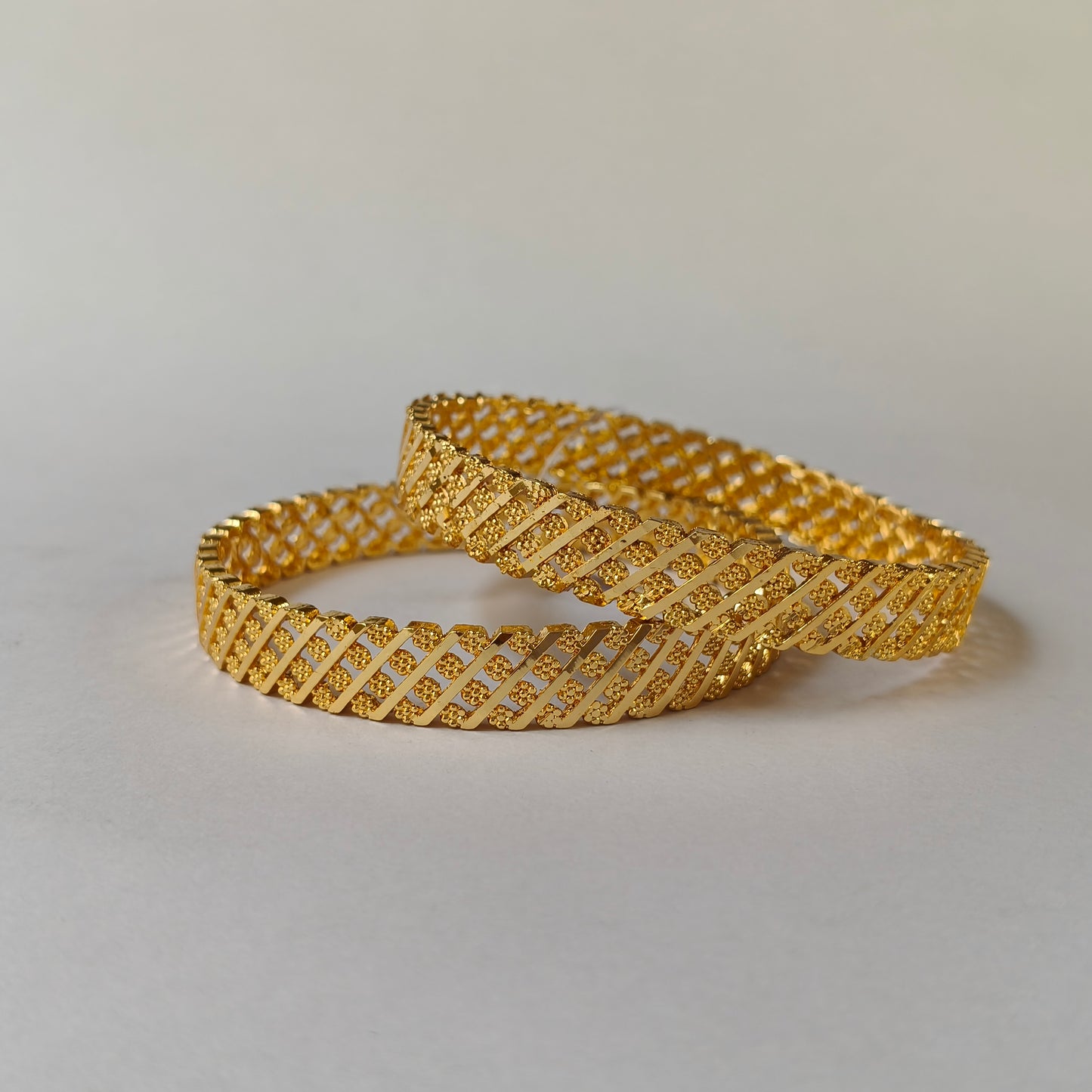 Geometric Intertwined Gold Textured Bangles - 4 Flowered