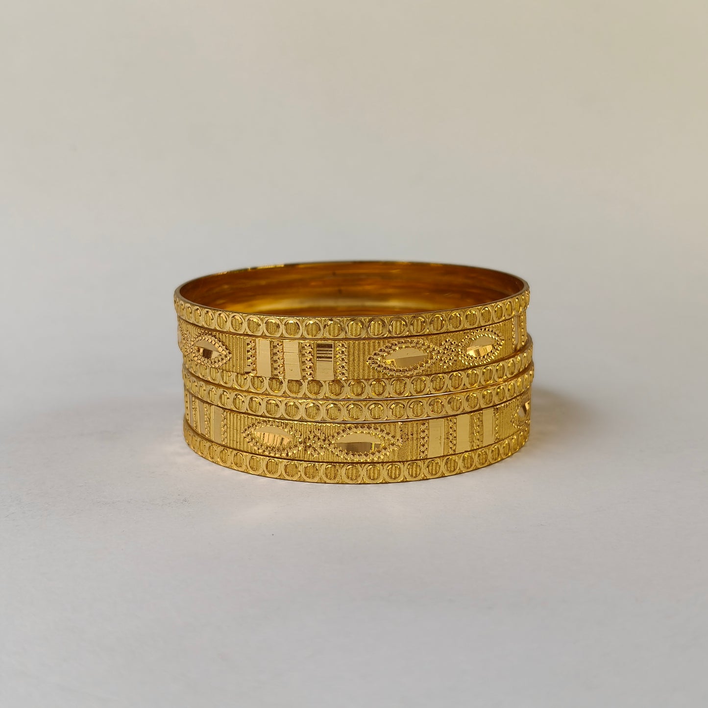 Intricate Textured Gold Stackable Bangles
